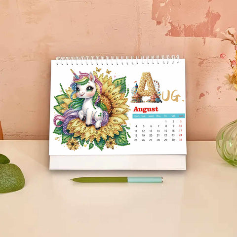 Image of August 2025 diamond painting desk calendar featuring unicorn and sunflower design, DIY craft for monthly planning