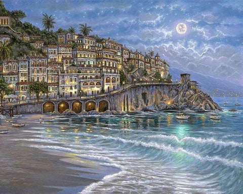 Image of Diamond painting of a lighthouse on a rocky cliffside at night, illuminated by the moon with crashing waves below.