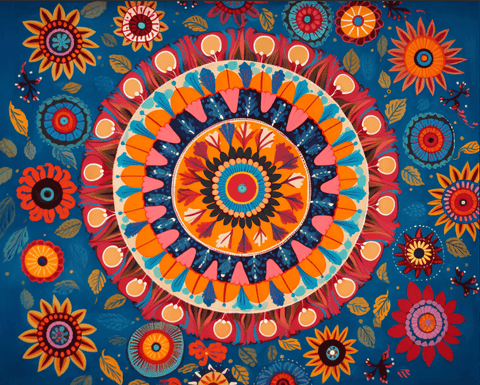 Image of Diamond painting of a blue mandala with white floral accents and a sparkling center.