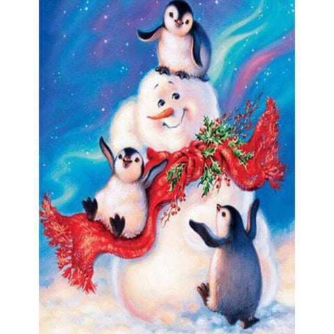 Image of diamond painting of penguins playing with a snowman