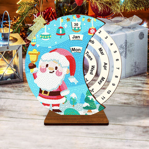 Image of Rotating diamond painting calendar featuring a Santa design, holiday theme, wooden base, with month and day indicators, DIY craft for festive monthly planning