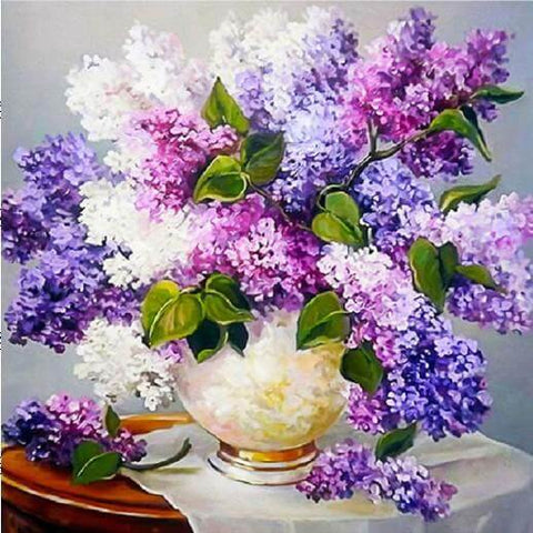Image of Diamond painting of a vibrant bouquet of purple and white hydrangea flowers in a vase.