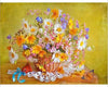 Diamond painting of a vibrant summer bouquet overflowing from a basket.
