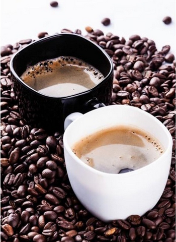 Image of Diamond painting of a black and white cup filled with coffee, surrounded by coffee beans