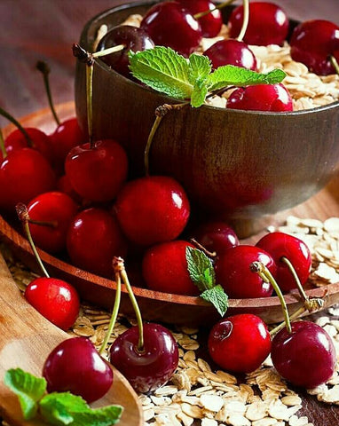 Image of Diamond painting of fresh cherries in a bowl with oatmeal