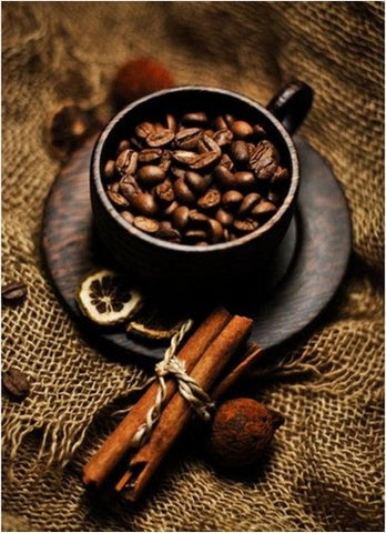 Image of Diamond painting of coffee beans in a cup with cinnamon sticks and dried orange slices