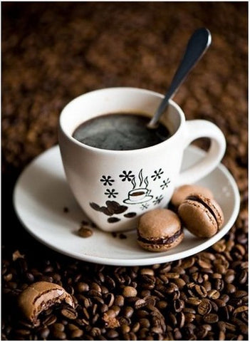 Image of Diamond painting of a cup of coffee with macarons on a bed of coffee beans