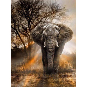 Diamond painting of a majestic African elephant standing in a savanna at sunset.