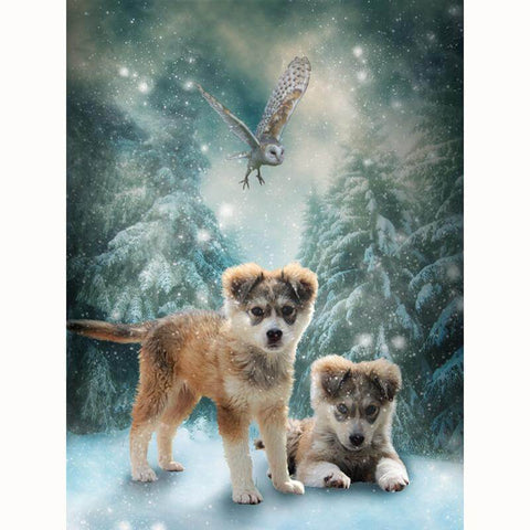 Image of Diamond painting of two puppies standing in the snow, with an owl flying overhead in a snowy forest.