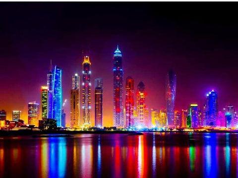 Image of Diamond painting of the Dubai skyline at night, reflecting in the water