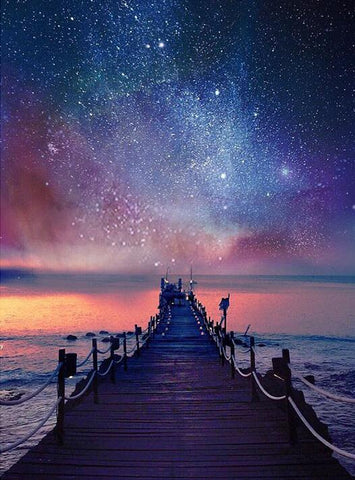 Image of Diamond painting of a wooden pier stretching into the ocean, with a starry night sky above.