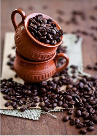 Image of Diamond painting of two stacked clay cups filled with coffee beans