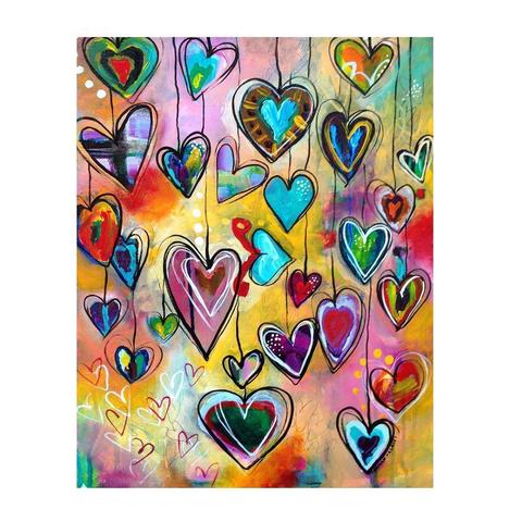 Image of Diamond painting of a collection of colorful, symmetrical hearts hanging from strings.