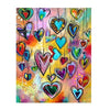 Diamond painting of a collection of colorful, symmetrical hearts hanging from strings.