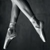 Diamond art depicting delicate ballerina's feet in pointe shoes.