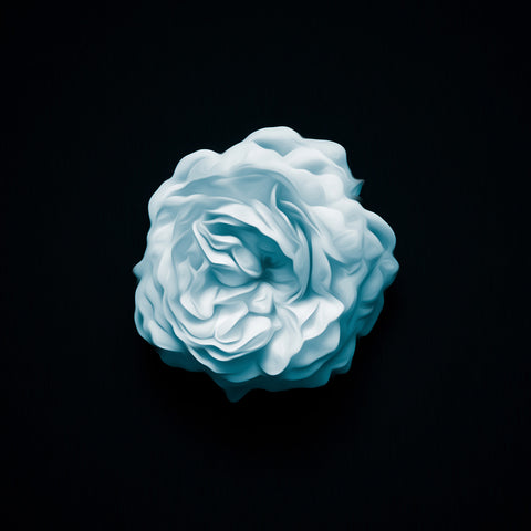 Image of Diamond painting of a single deep blue rose on a black background.