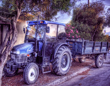 Diamond Painting of a Blue Tractor with a Trailer