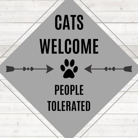 Image of Diamond painting of a sign that says "Cats Welcome, People Tolerated," with a paw print and arrows.