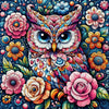 Sparkling diamond art depicting a majestic owl surrounded by vibrant flowers