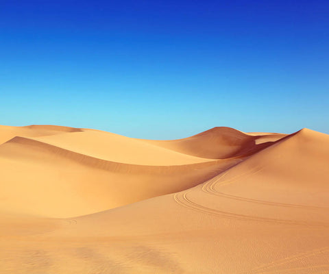 Image of Diamond painting of a vast desert landscape with rolling sand dunes under a bright blue sky