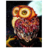 Diamond painting of a majestic barn owl perched on a branch on a starry night, under the full moon.