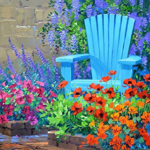 Image of diamond painting of a blue chair in a colorful flower garden