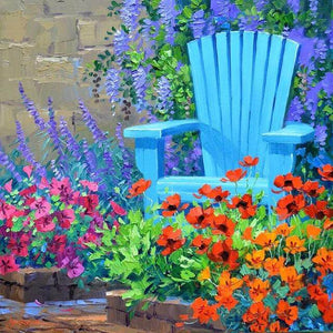 diamond painting of a blue chair in a colorful flower garden