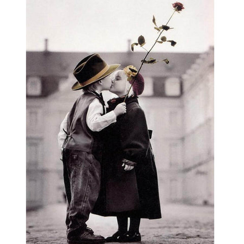 Image of diamond painting of a boy and girl kissing with a rose, in black and white background