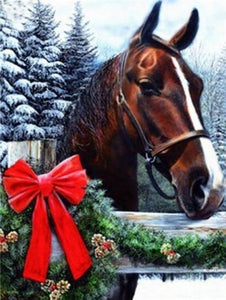 Diamond painting of a brown horse in winter wonderland.