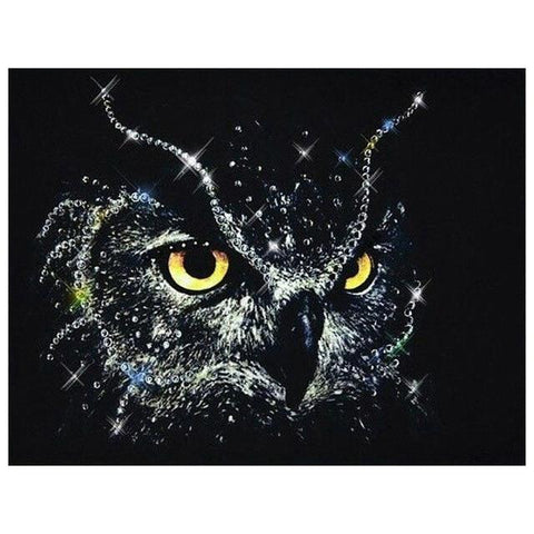 Image of Diamond painting of a sparkling crystal owl with big yellow eyes