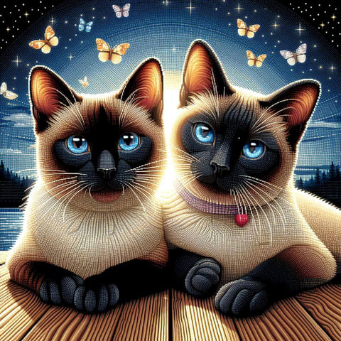 Image of Sparkling diamond art featuring two Siamese cats curled up together.