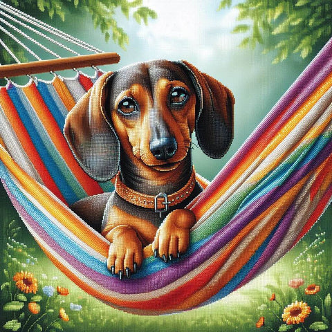 Image of Diamond painting of a dachshund dog relaxing in a colorful hammock.