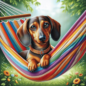 Diamond painting of a dachshund dog relaxing in a colorful hammock.