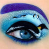 diamond painting of an eye with a penguin scene