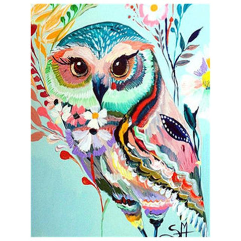 Image of Diamond painting of a beautiful floral owl with a body formed by pink and purple flowers, perched on a branch.