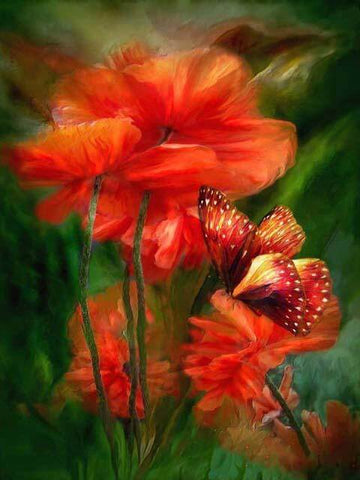 Image of diamond painting of glowing orange iris flowers with a butterfly