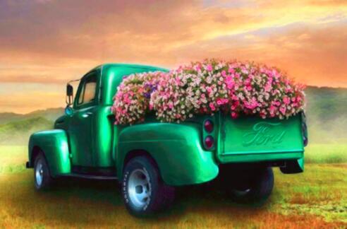 diamond painting of a green vintage truck filled with colorful flowers