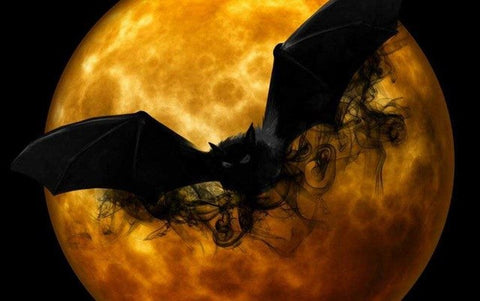 Image of diamond painting of a spooky bat flying in front of a full moon