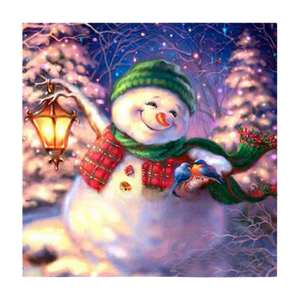 diamond painting of a smiling snowman holding a lantern in a winter scene