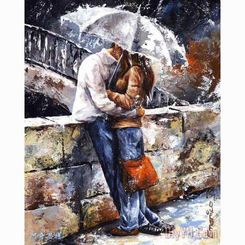 Image of diamond painting of a couple kissing in the rain