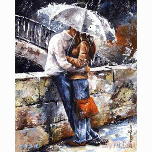 diamond painting of a couple kissing in the rain