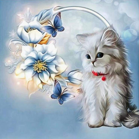 Image of diamond painting of a white kitten with blue flowers