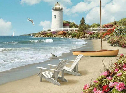 Diamond painting of a lighthouse on a beach with Adirondack chairs and a boat.
