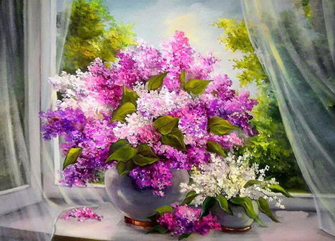 Image of diamond painting of a bouquet of purple lilacs on a windowsill