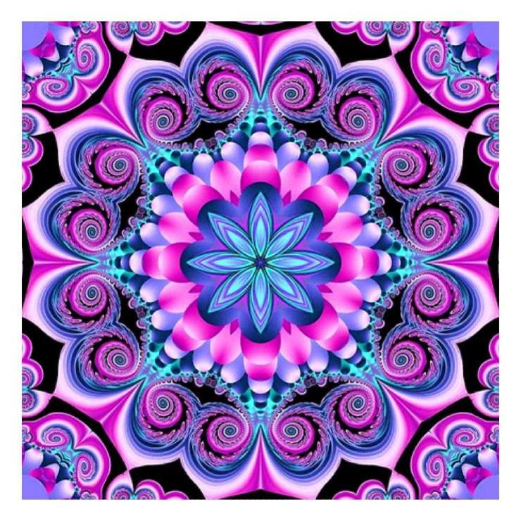 Diamond painting mandala with a blue starburst pattern.
