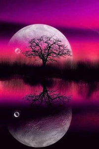 diamond painting of a large moon reflecting on a lake with a tree