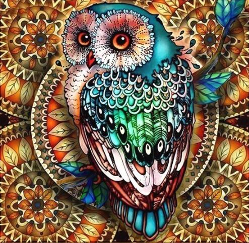 Diamond painting of a mosaic owl with geometric and floral patterns.