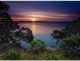 diamond painting of a river at sunset with trees and a purple sky