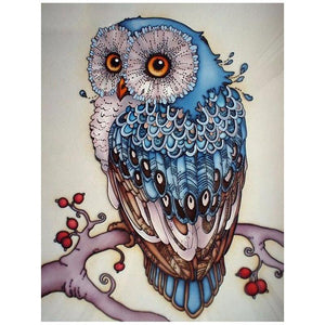 Diamond painting of an owl, perched on a snowy branch.