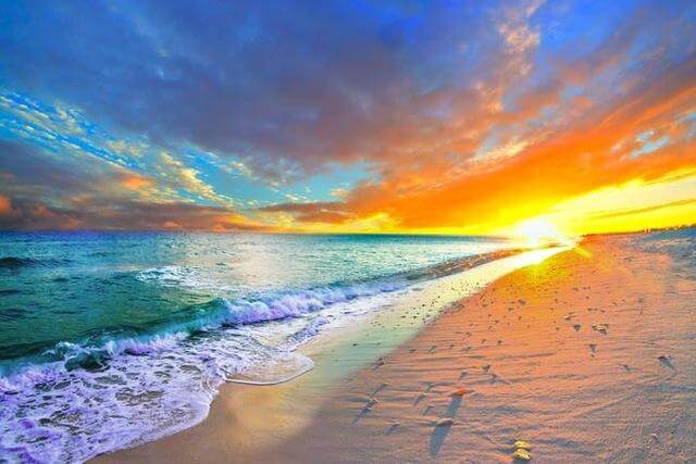 Diamond painting of a photorealistic sunset over a calm ocean